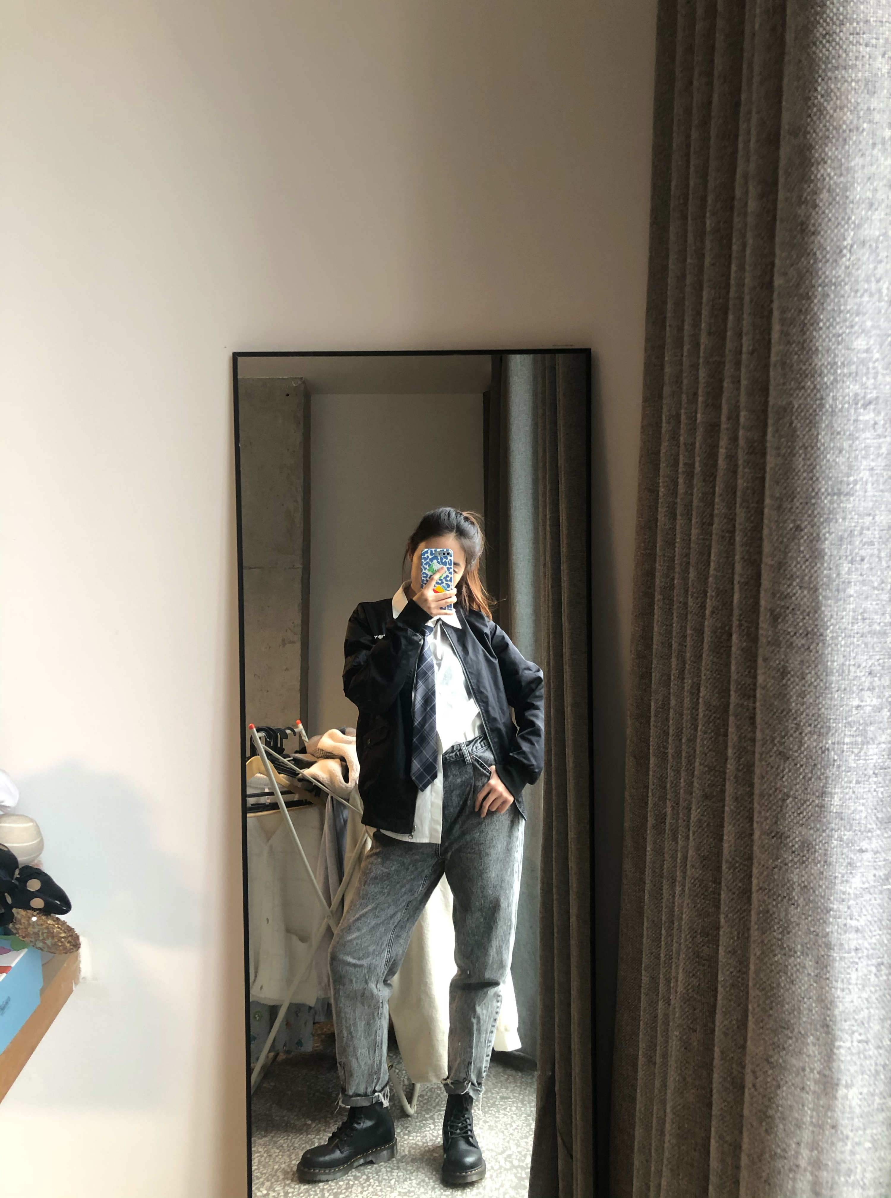 black jacket black boot